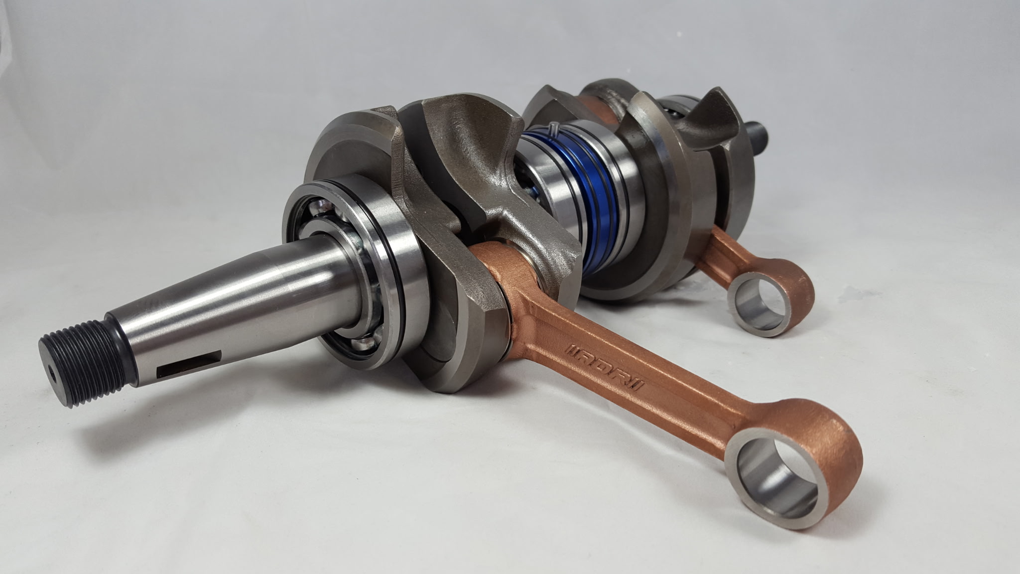 Freshly rebuilt 2-stroke crankshaft with new connecting rods and bearings